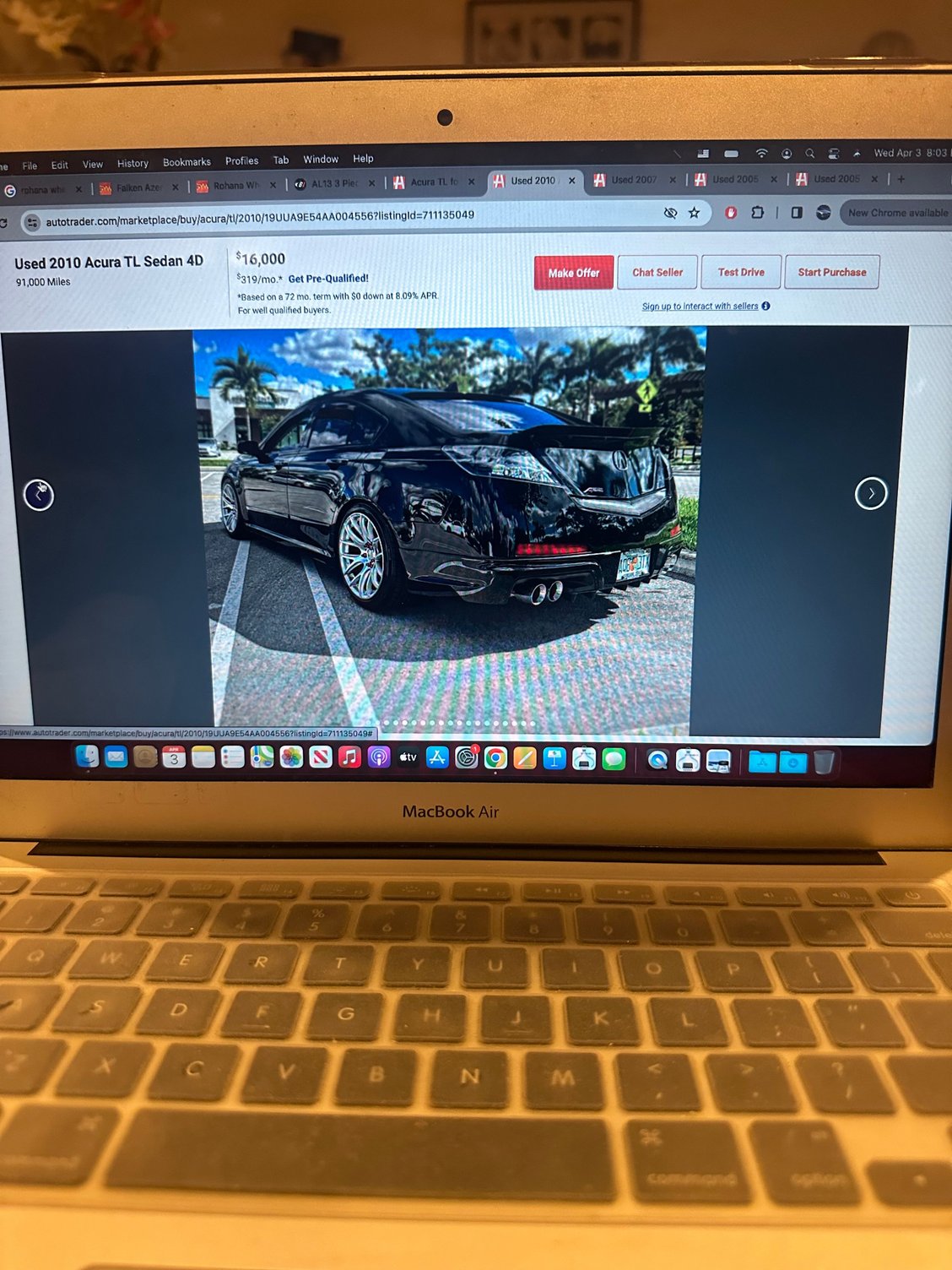 These two photos are old photos of a person who listed their TL, and I wanted to find what spoiler he had on and where to purchase one, please someone help!$!