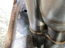 The front headers were hitting the subframe so trimmed a small tab off the 2nd layer and then made 2 small cuts heated and smashed in a small section. Weld the cuts after.