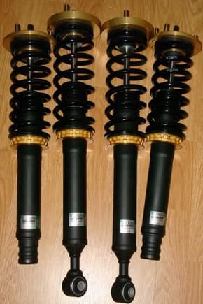 Tein Comfort Sport Coilovers.  These are installed on my TSX.
Controlled by Tein EDFC in the dash.