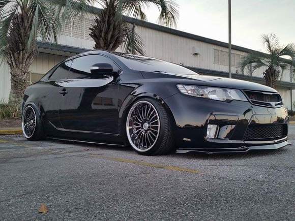 My Koup on 18x9 Lexani's Static on Eibachs. She Recently totaled. Miss her.