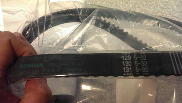 New Honda Timing Belt showing Manufacture Date  Information: Distance (130), Year (5 for 2015), Week (32)