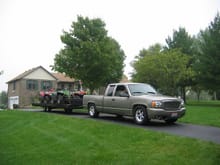 My truck and 8x24' trailer. It was actually a 6-place snowmobile trailer, but works awesome for ATV's!                                                                                                  