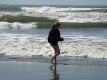 My daughter running from the waves.                                                                                                                                                                     