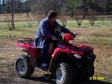 My Grandson Stephen and I on my new King Quad                                                                                                                                                           