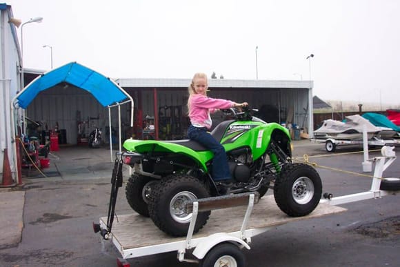 The money has been paid, the V is loaded. Ready to go home and try it out. Get off my new quad you little brat!!!