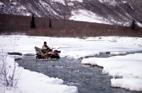 November crossing of Kings River, Permanente Trail, Alaska.