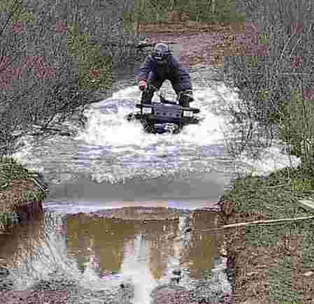 This is me on my 2001 Sportsman 500 HO/personal water craft at a water crossing up in the Madawaska area.