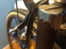 Roller incorporates into cable attachment bolt