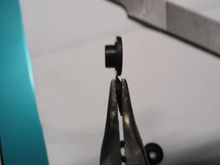 This is the bushing ledge washer from the side view.  Note the step down for the bushing portion of the washer.