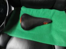 An old Avocet sponge saddle with the cover that moves around while riding.  Ugly and uncomfortable.
