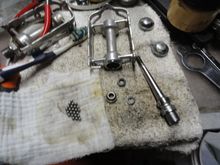 All the parts cleaned and ready for re-assembly.
You can see all of the dirt on the rags that came off this pedal.  Just a quirk of mine, but the white shows the dirt and leftover grease pretty well.
