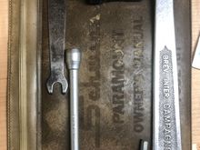 1. Pouch
2. Peanut butter wrench
3. Campy extractor
4. T wrench
5. Pineapple allen tool
6. Chainring nut tool
7. Seat spanner (not in pic)
