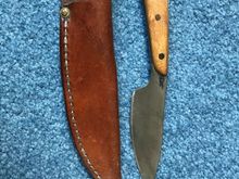 This started as a self handled demo knife from a forging class, had scales put on it, and a sheath made for it. 