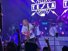 Multigenerational crowd keeping rock alive