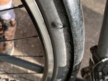 I think the nail damaged the sidewall. 