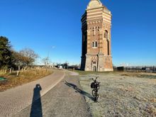 I encountered this tower on my way to the North Sea. Note my shadow at noon in December. The sun rises to about 30 degrees above the horizon at this time of year. 
