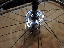 The direction of the outer flange spokes is placed in the pattern in the opposite way from the initial set of drive spokes.  Visually you can see the cross pattern starting to emerge. 