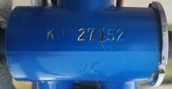 FSN: KJ 27152
I think this decodes as:
K = U.S. market
J = 0  (Frame manufactured in 1980, by Kawamura, I presume...?)

P.S.  What does the stylized "M" (Or "W", if inverted) mean?