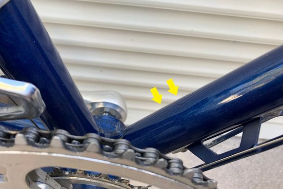 Two very mild dings topside of the downtube