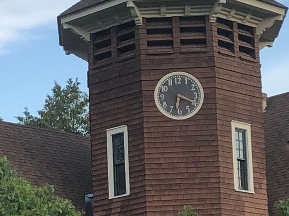 A man wound clock in Westport at their library.