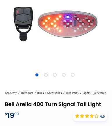 Center is red LED that toggles solid re, flashing red and off. 