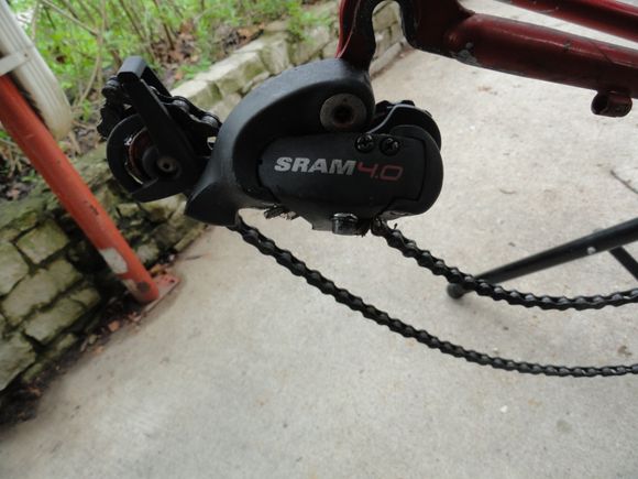 Comes with Sram 4.0 RD, and chain has been scrapped.