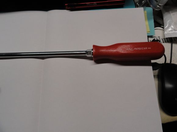 The screwdriver that was adapted for a leverage bar.  Mac Part number is accurate if you want to make one.  Just remember it is pricey.