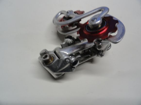 When they are finished they are a bit brighter and with new jockeys they will run better.  What you can't see is the machined down spacers for the inner side of the bearing race.  The ?Chaser come with a 7mm diameter inner race hole and the spacers reduce the hole to 5mm which is thecampy bolt spec.