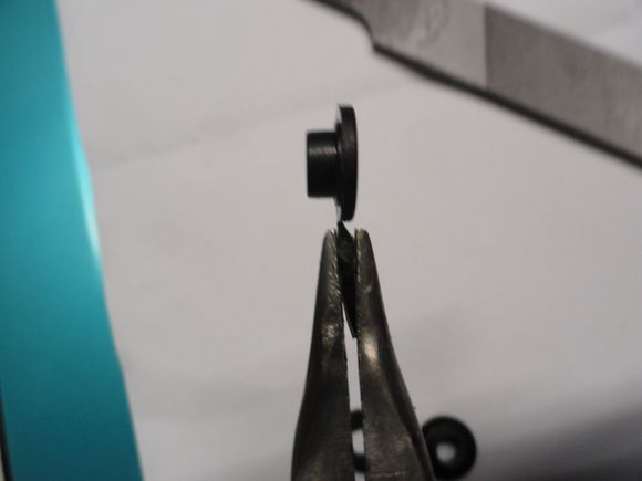 This is the bushing ledge washer from the side view.  Note the step down for the bushing portion of the washer.
