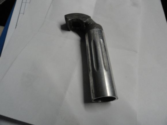 a used 25.0 seat post top with the fluting intact.  Perfect for a weld on a forward set seat post.