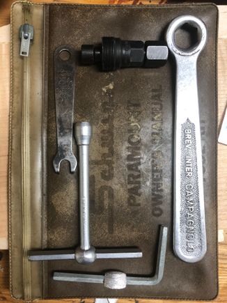 1. Pouch
2. Peanut butter wrench
3. Campy extractor
4. T wrench
5. Pineapple allen tool
6. Chainring nut tool
7. Seat spanner (not in pic)
