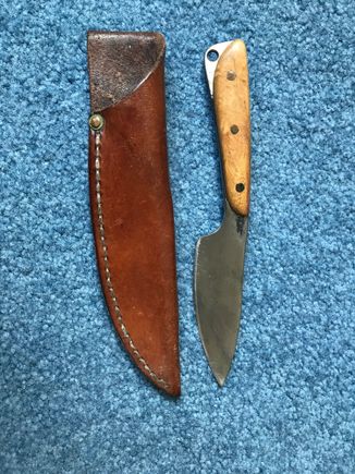 This started as a self handled demo knife from a forging class, had scales put on it, and a sheath made for it. 
