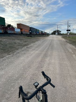 Gravel road along the railroad. 