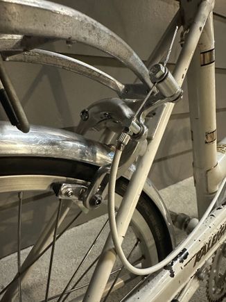 Made a spacer to get the cable to run from the bottom on the Tektro 800a