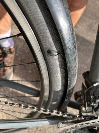I think the nail damaged the sidewall. 