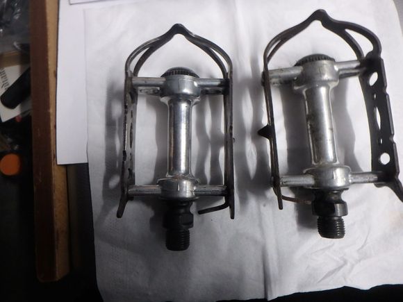 The cages are steel and could use a good coat of black paint, and the spindles are I think in fine shape.  It appears that one has been overhauled recently and the other needs some love.  But the price of admission is the cost of postage, probably ten bucks.