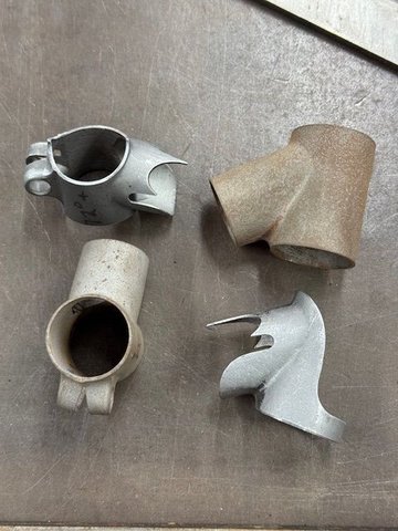 Showing the blank lugs I got from Jack Briggs and the shape Raphael carved 
