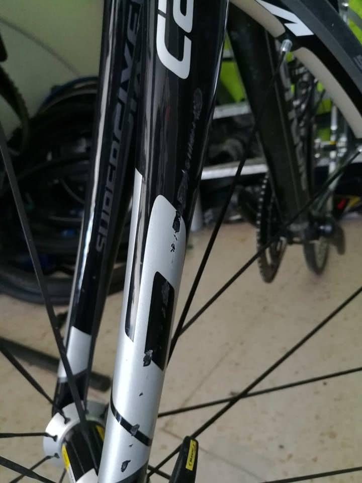 scratched carbon bike frame