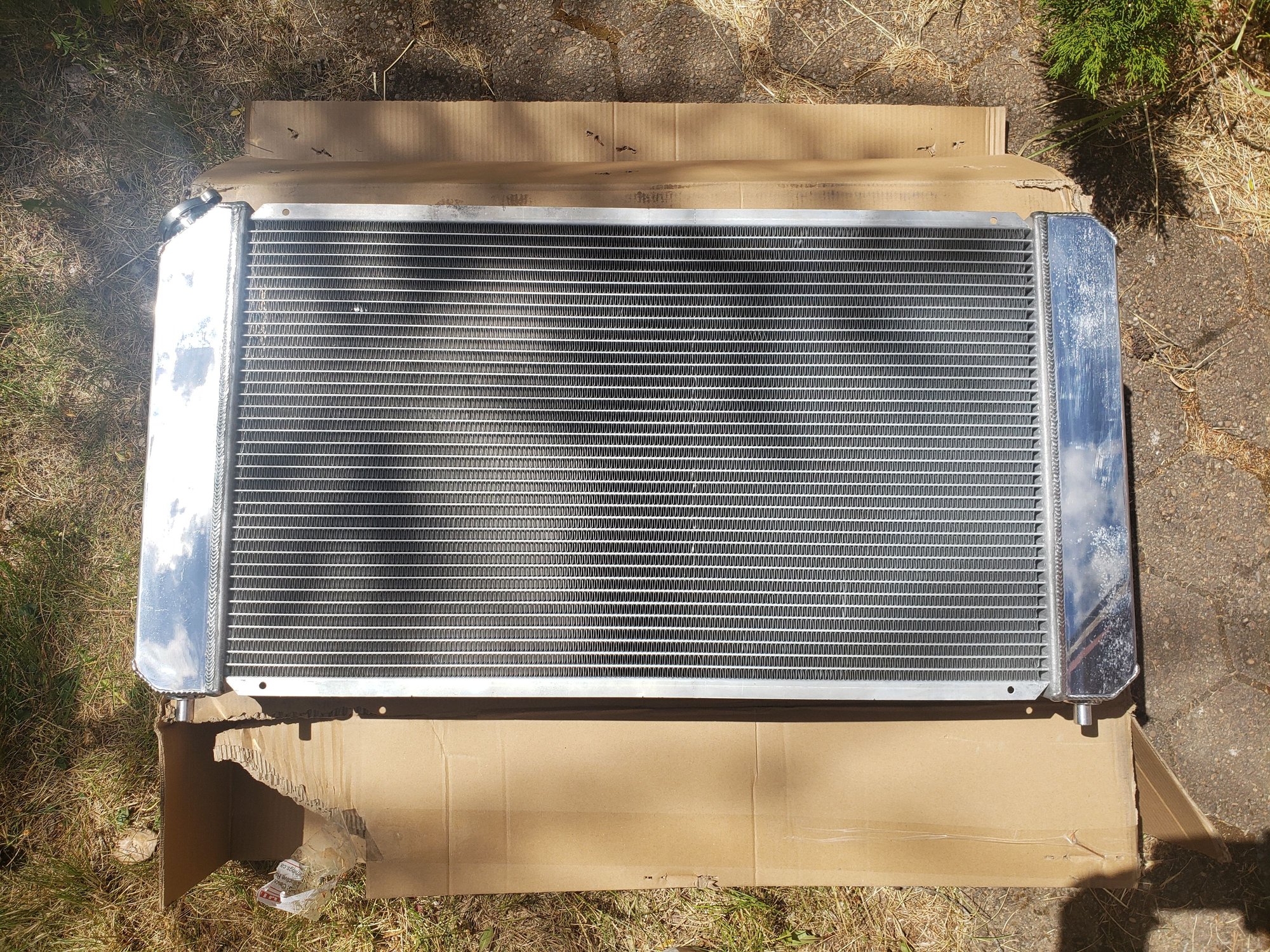 Front, grille-facing side, of the radiator.