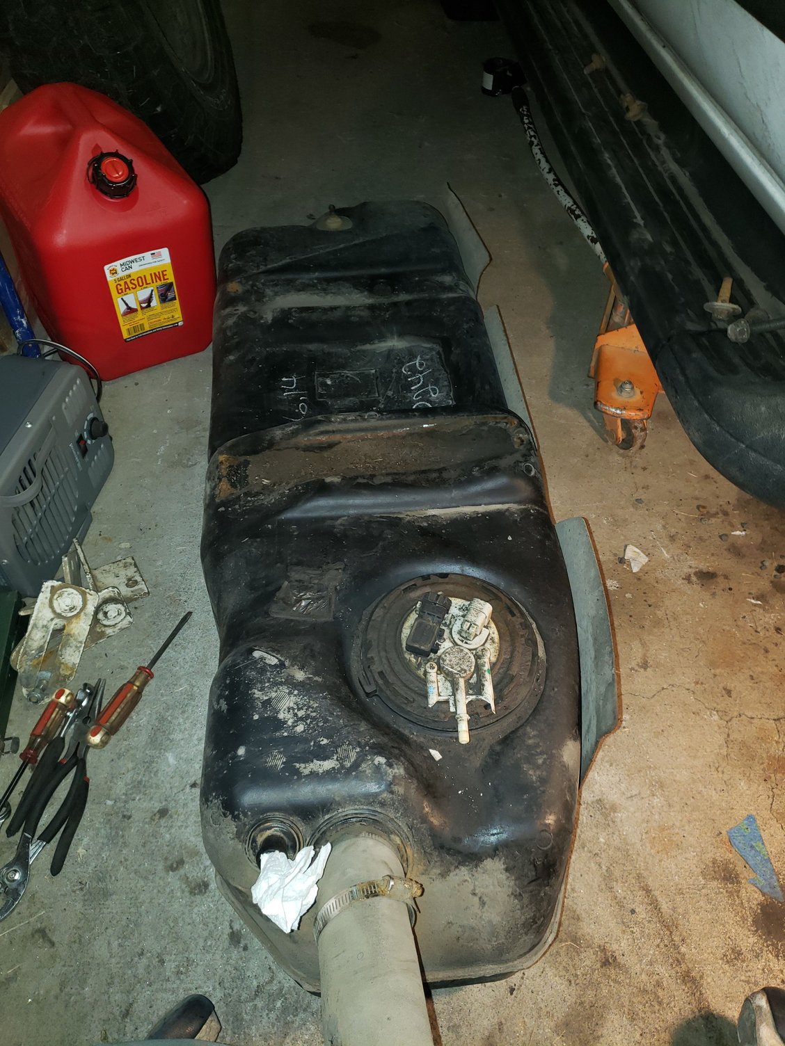 The tank removed. I had to park my Blazer all the way over on the other side of my garage to get enough room to work. Ack. 