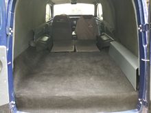Headliner and rear air from an escalade, on the right, tools, jack and custom jumper cables on left