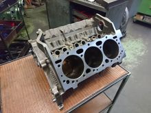 cam bearings out, all cam bearing bores chamfered, cylinder bases chamfered, ready to be honed.

we have decided against boring. with the new forged pistons which are 0,002 inches over we save pn machining and retain maximum wall thickness for nitrous or such experiments. ;)