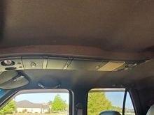 Long console, no sunroof.