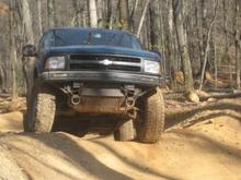 Repaired my damaged chrome grille with epoxy and painted it black cost less than $10. Removed factory valance-Free. 1.5" tbar crank, homemade add-a-leaf,1.5" shackles and 2" body lift,runnin 31x10.50's