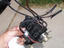 1996 OEM FI spider ~ was leaking and making warm starts take too long.  There was also a slight misfire during highway speeds.  The improved assembly ( see other photo ) kicks ass and retailed at about $450 at the dealership.