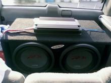 two "12 inch 1500 watt rms Alpine Type-R's, Mono-channel 1000 watt rms amp (have subs bridged to 2ohms so they are gettin 1000 a piece), &amp; Ground Shaker ported box.