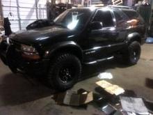 Rockcrawler wheels 15x7 w/chrome caps
Mickey Thompson MTZ 31x10.5
1.125 rear billet spacers
2"shackles 
K&amp;N cold air intake 
Flowmaster 40 original series 
visors