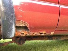 Rot in front of passenger side rear wheel.  The driver's side looked similar but not as severe.