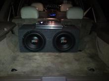 rear trunk w/ 2 12"'s and a 800w Power Acoustic amp this truck also has a bluetooth HD intergrated radio