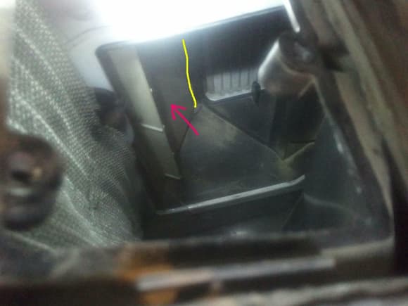 The evaporator is on the left and the heater core is in the upper center part of the picture. The blend door is identified with the cyan arrow and the pivot axle for the blend door is identified with the yellow line.